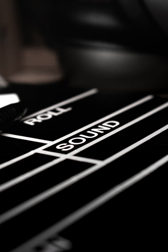 Mastering the First Impression: Your intriguing post title goes here Artistic black and white close-up of a film clapperboard focused on the word 'SOUND'.